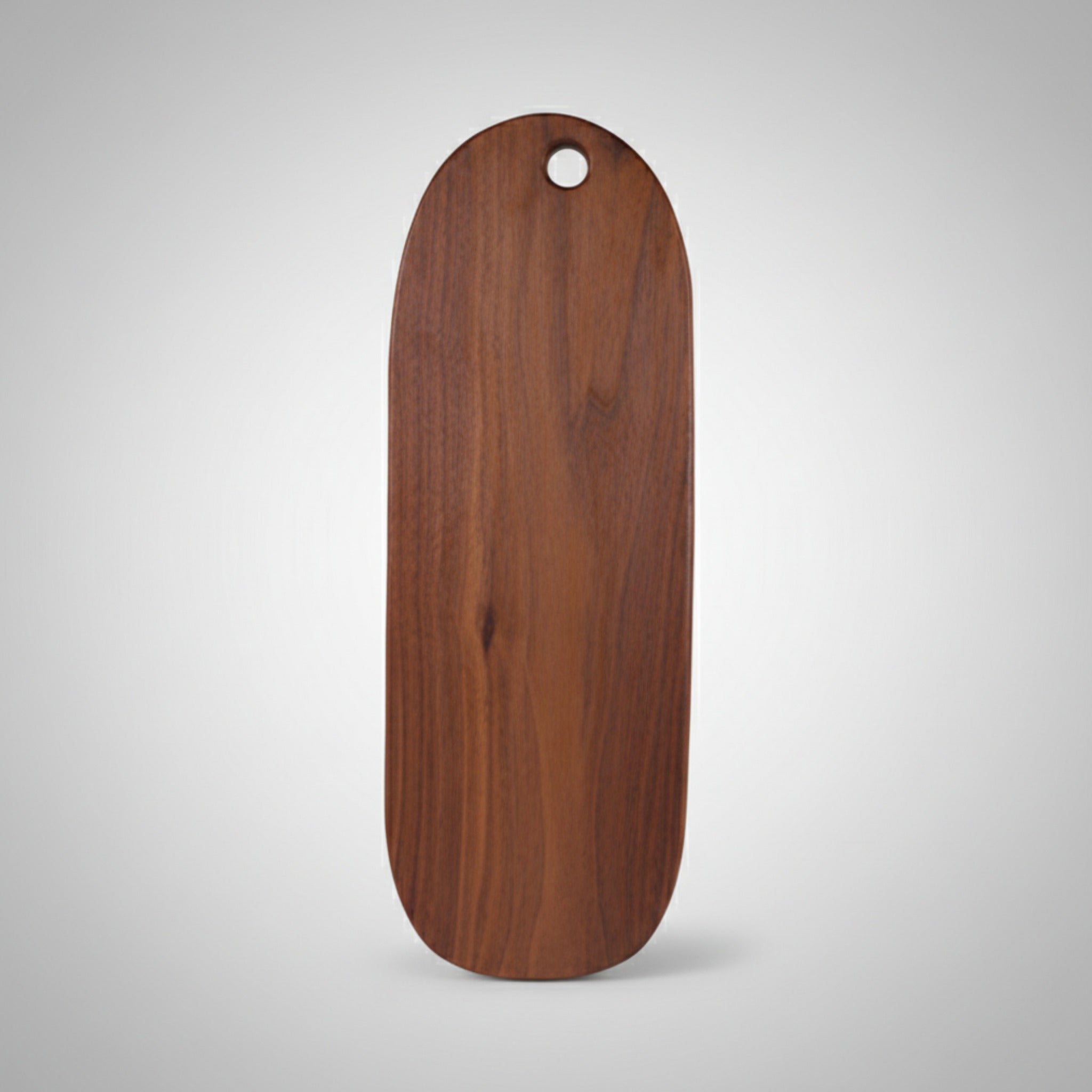 Grande planche à découper en noyer noir ovale